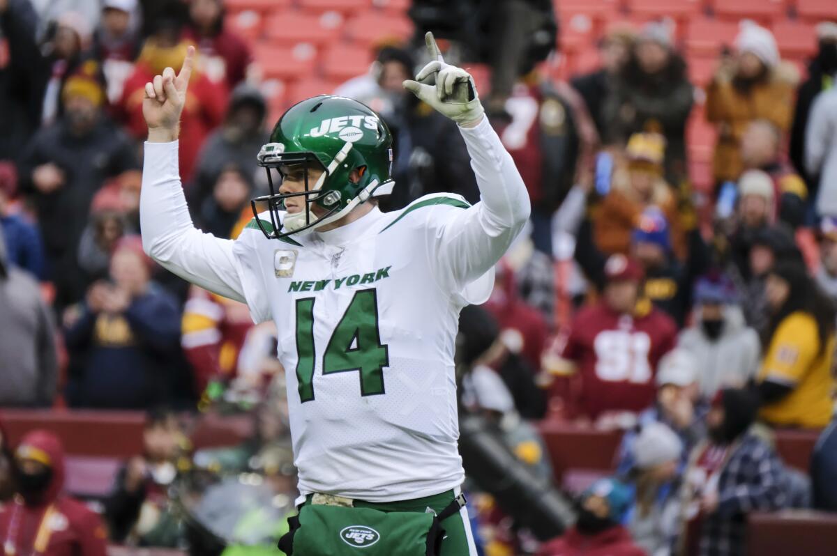 Jets quarterback Sam Darnold (14) celebrates a touchdown against the Redskins during a game Nov. 17. 