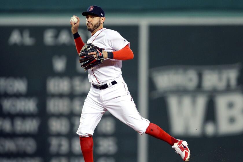 BOSTON, MA - OCTOBER 14: Ian Kinsler #5 of the Boston Red Sox throws out the runner during the second inning against the Houston Astros in Game Two of the American League Championship Series at Fenway Park on October 14, 2018 in Boston, Massachusetts. (Photo by Maddie Meyer/Getty Images) ** OUTS - ELSENT, FPG, CM - OUTS * NM, PH, VA if sourced by CT, LA or MoD **