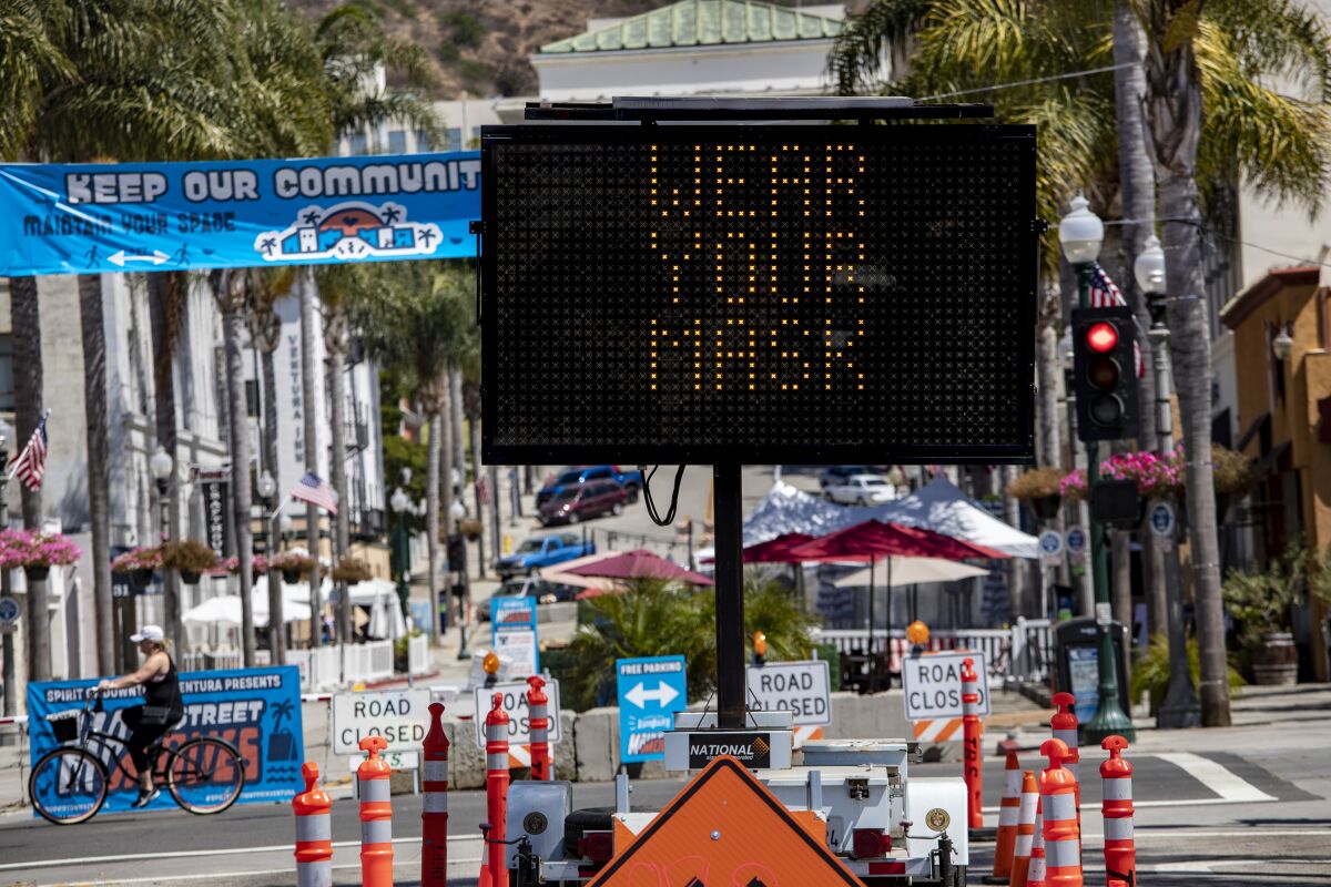Sign reading "wear your mask," in the city of Ventura