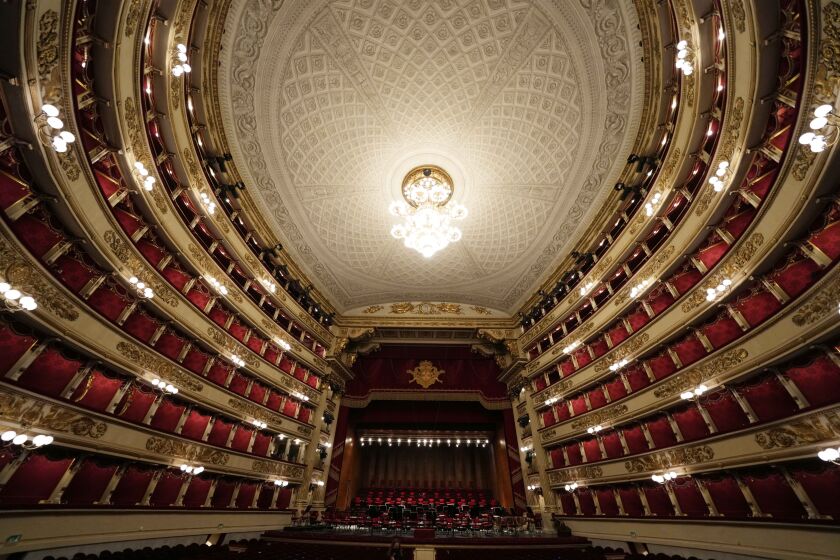 FILE - A view of an empty La Scala opera house in Milan, Italy, on April 4, 2022. Italy’s most famous opera house, Teatro alla Scala, opens its new season Wednesday Dec. 7, 2022 with the Russian opera “Boris Godunov,” a selection that sparked Ukrainian protests of the cultural event serving as a propaganda win for the Kremlin against the backdrop of Russia’s invasion of Ukraine. (AP Photo/Luca Bruno, File)