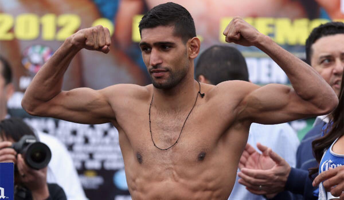 Amir Khan could wind up on the undercard when Floyd Mayweather Jr. fights Marcos Maidana on May 3.