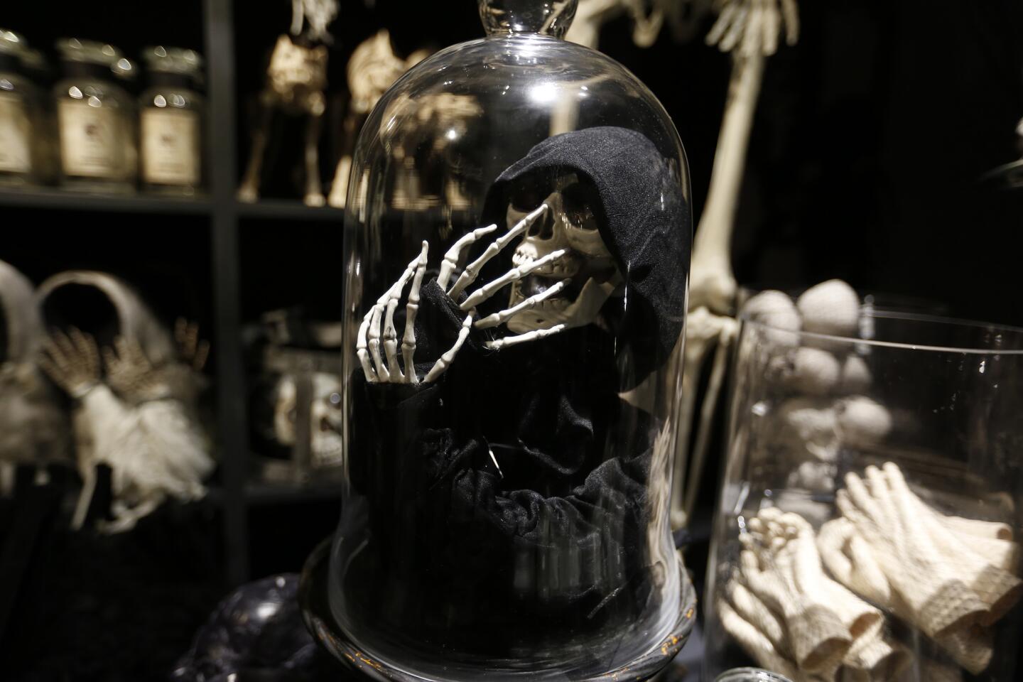 Skulls and all things skeletal are grouped in the Sleeping Beauty section of Roger's Gardens' Halloween-themed Grimm Tales Halloween boutique in Corona Del Mar.
