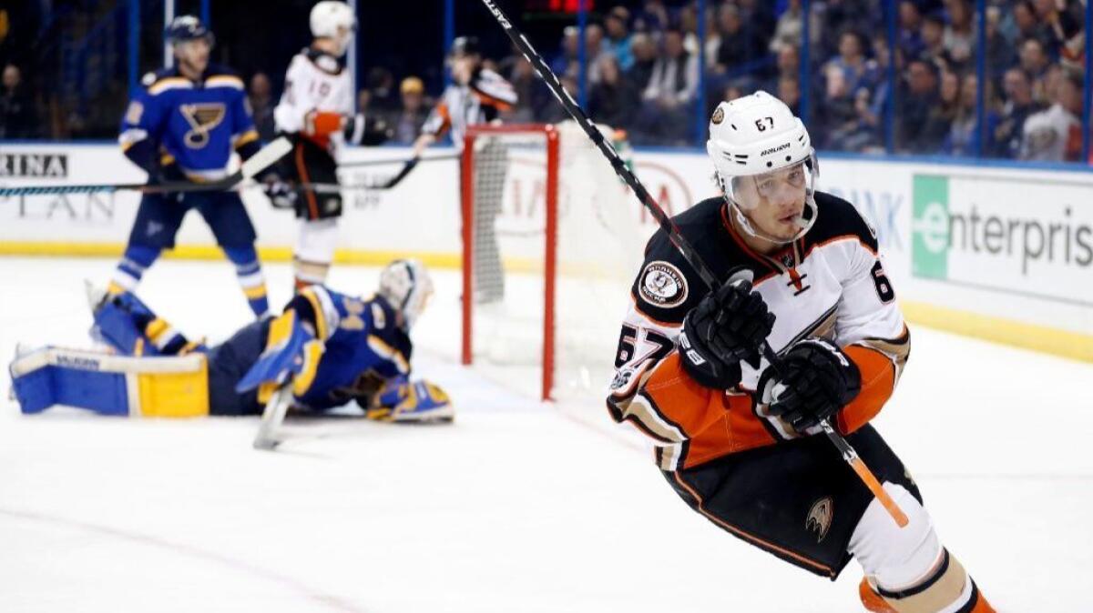 Ducks center Rickard Rakell skates away after scoring on Blues goaltender Jake Allen during the first period of a game on March 10.