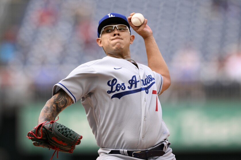 Dodgers starting pitcher Julio Urias throws during the first inning of a baseball game against the Washington Nationals