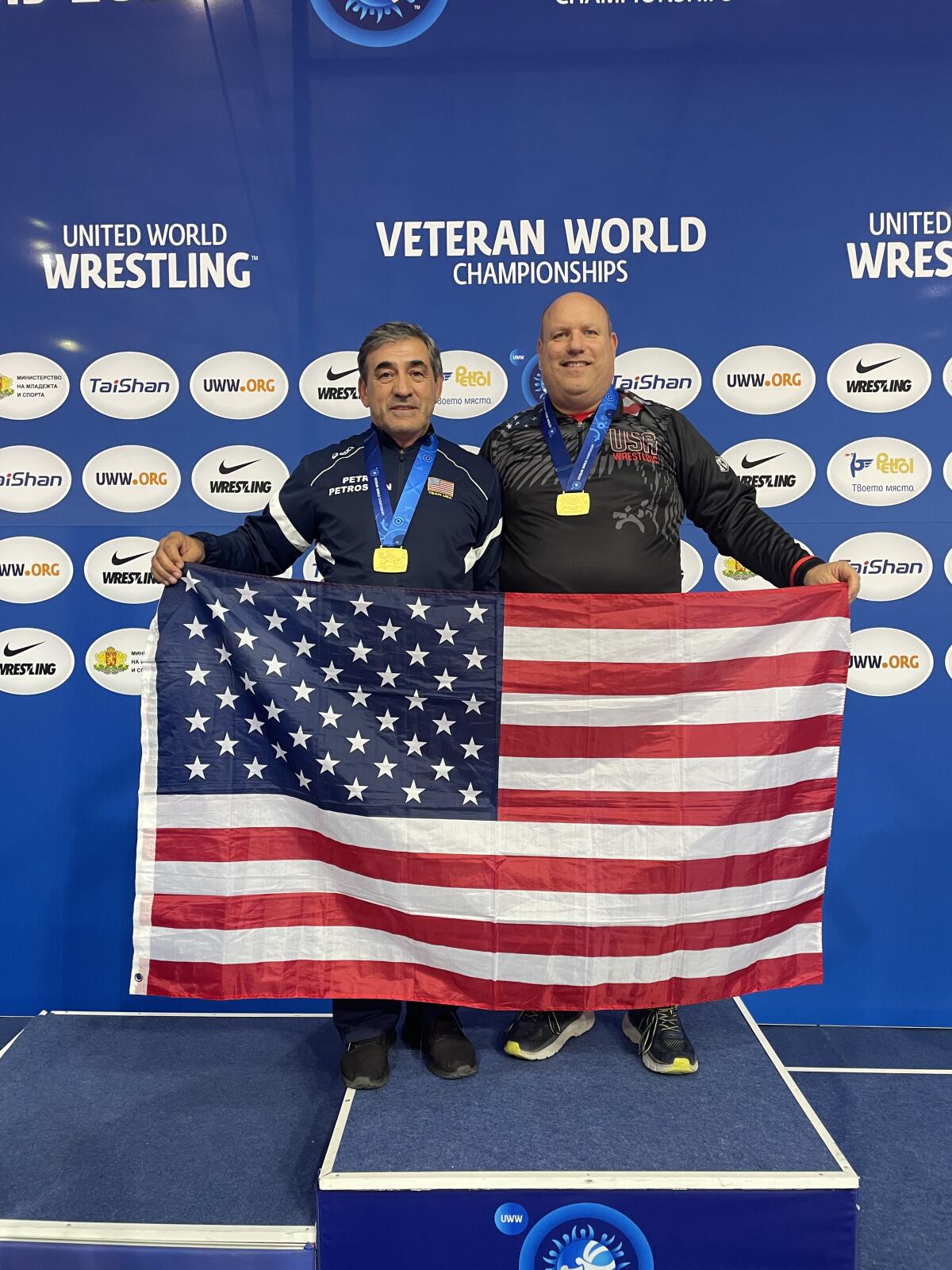 Petros Petrosyan, left, and Brian Jones at the 2022 United World Wrestling Veteran World Championships.