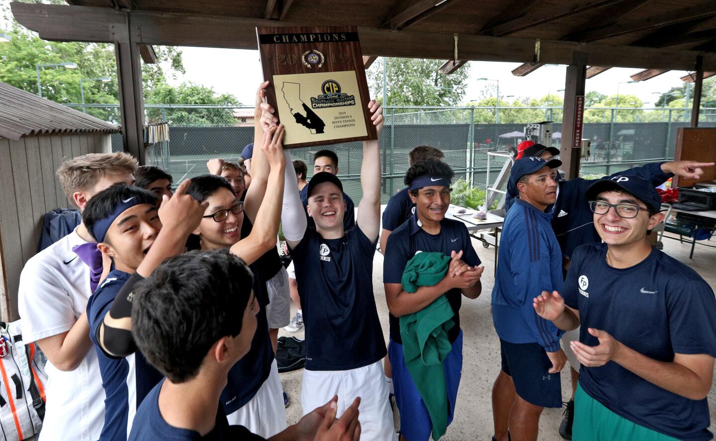 Flintridge Prep tennis team celebrates their win vs. Maranatha High in the CIF Southern Section 2019 Boys Team Tennis Championships, division 4, at The Claremont Club in Claremont on Friday, May 10, 2019.