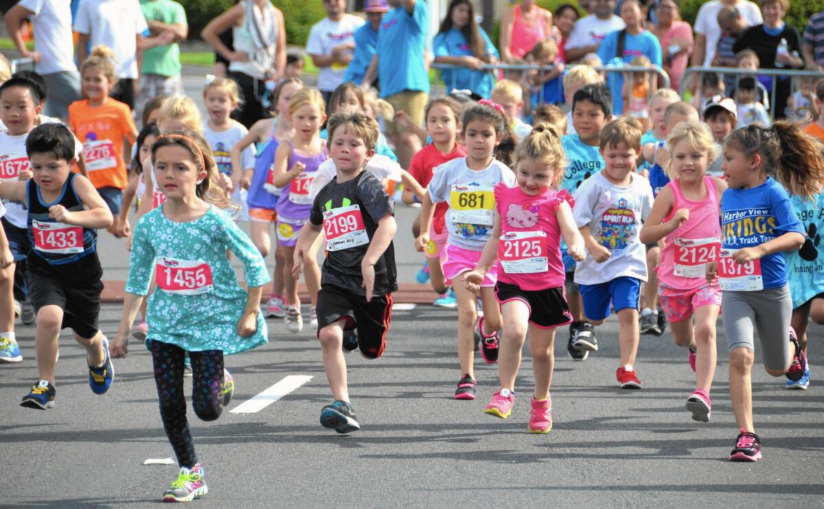 Five-year-olds take off from the starting line in last year's 32nd Annual Spirit Run-Race For The Schools in Fashion Island.