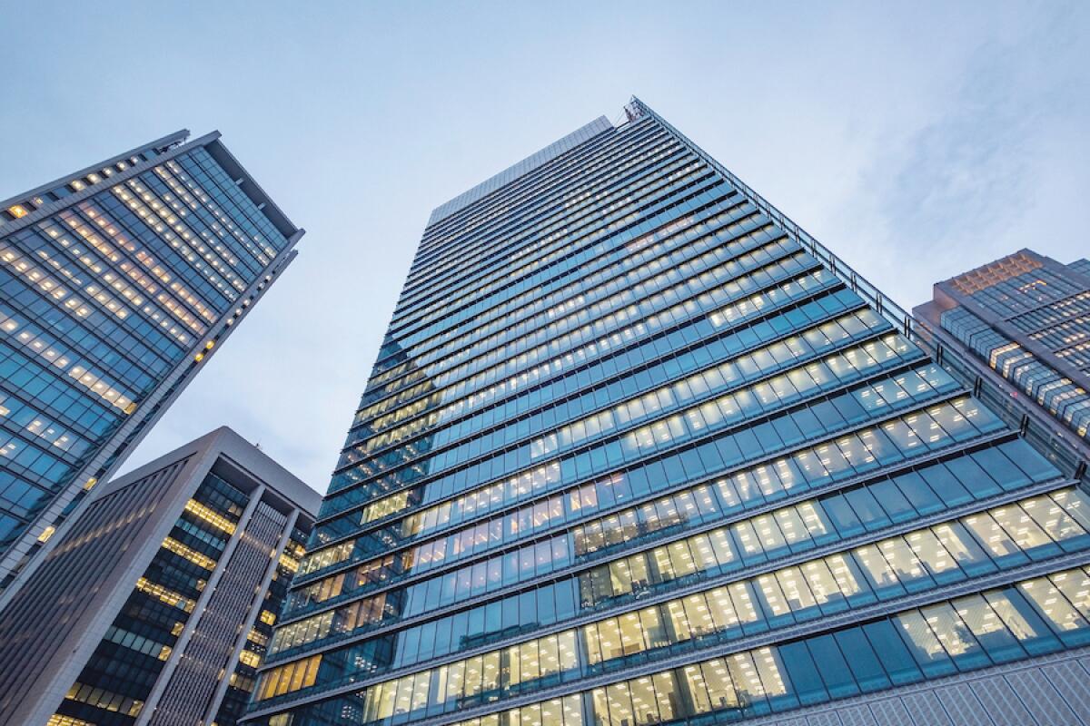 Windows of skyscraper business office buildings