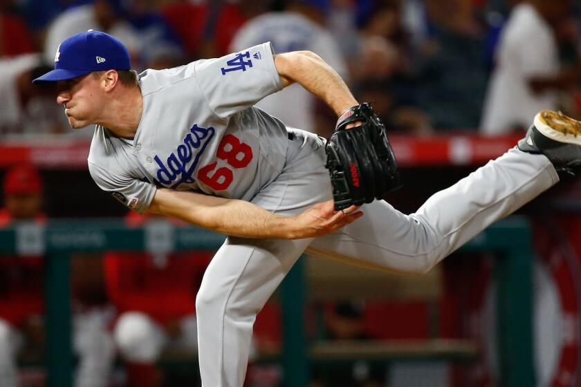 ANAHEIM, CALIF. - JUNE 10: Los Angeles Dodgers relief pitcher Ross Stripling (68) pitches against the Los Angeles Angels during a Major League Baseball game at Angel Stadium on Monday, June 10, 2019 in Anaheim, Calif. (Kent Nishimura / Los Angeles Times)