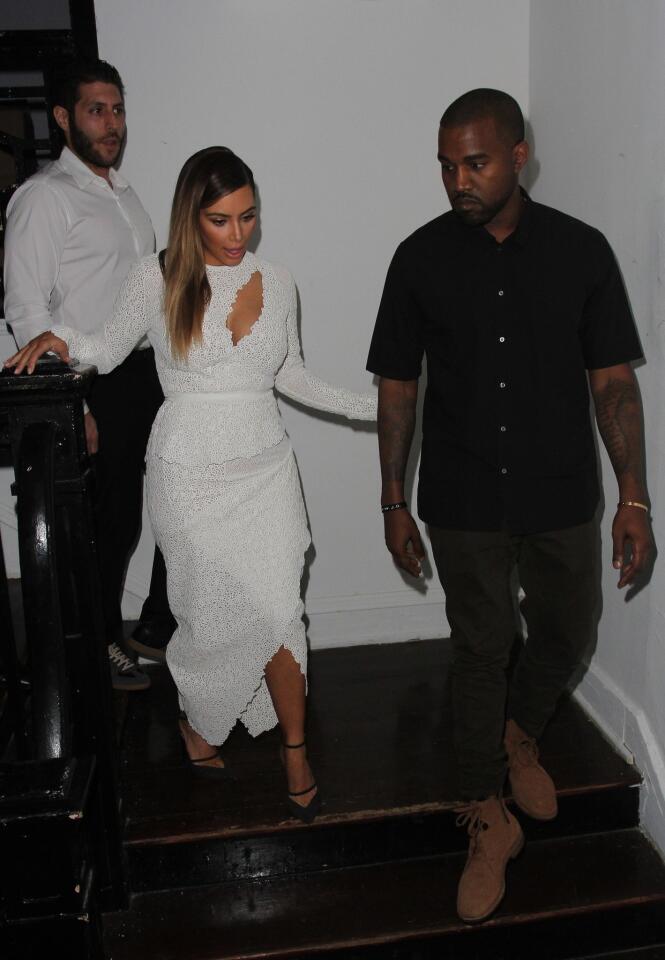 Kanye West and Kim Kardashian attend DuJour Magazine's event to honor artist Marc Quinn at Delano Beach Club on Dec. 4, 2013, in Miami Beach.