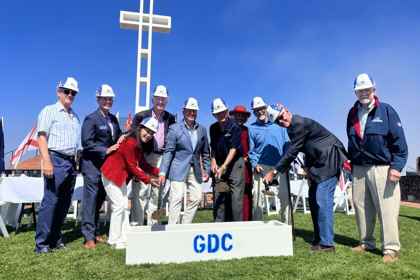 Mount Soledad Memorial Association members, donors and others put spades in the ground for Phase III of the memorial.