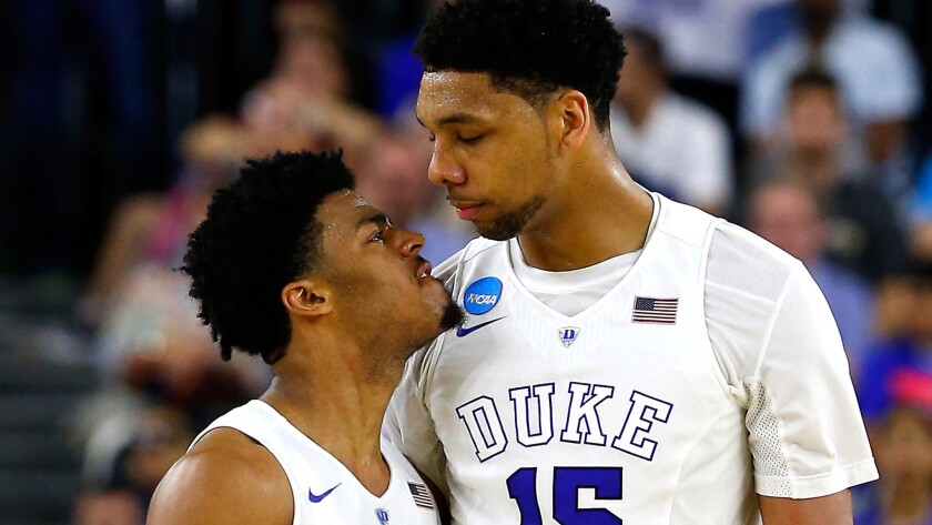 Duke guard Quinn Cook, left, and center Jahlil Okafor celebrate during the second half of an NCAA tournament game against Gonzaga on March 29.