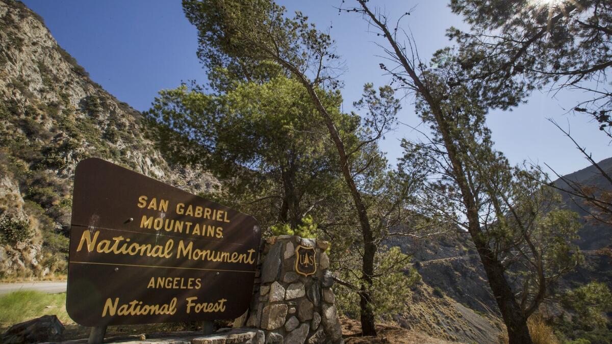 A sign is posted at the entrance to the San Gabriel Mountains National Monument near Azusa.