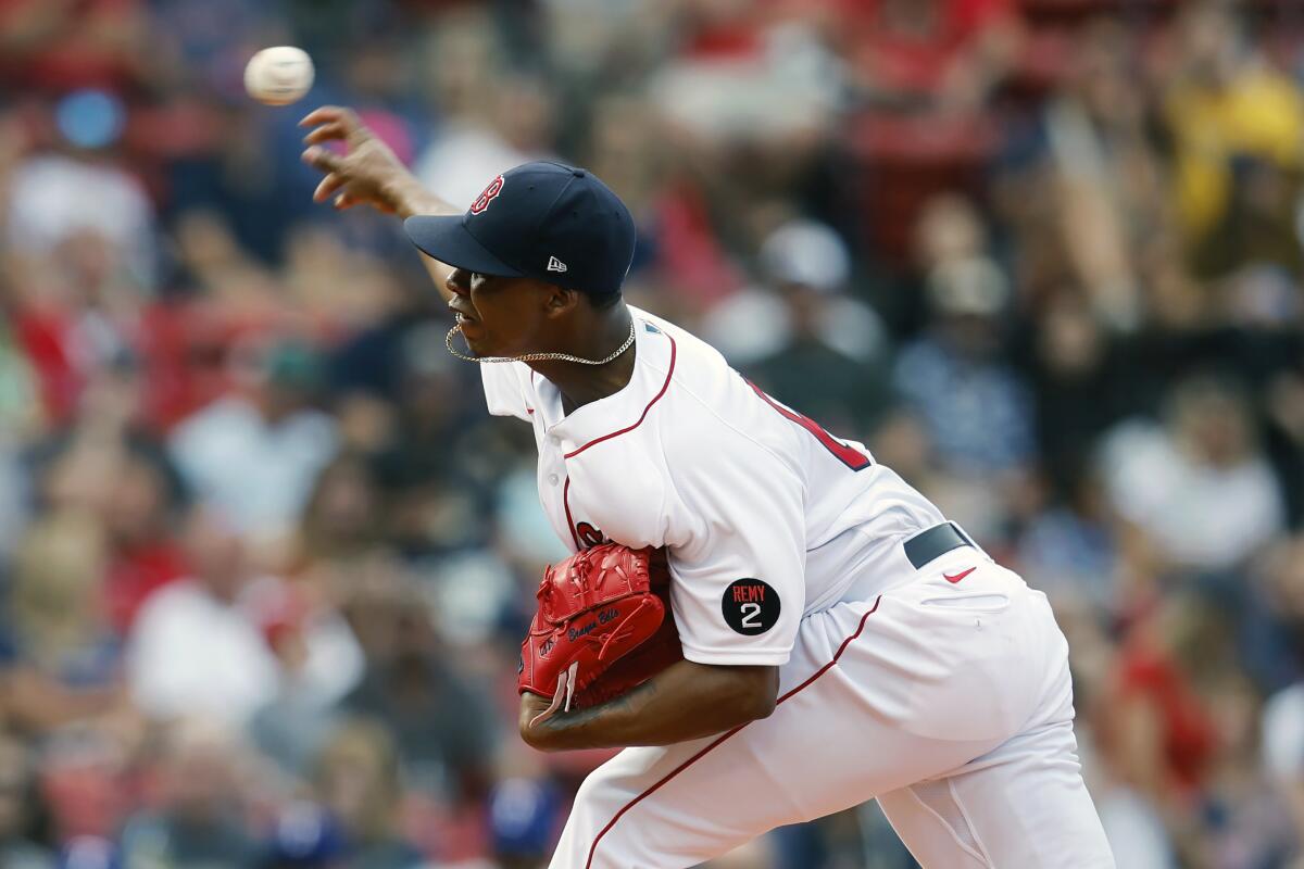 Boston Red Sox's Brayan Bello pitches during the first inning of a baseball game against the Texas Rangers, Saturday, Sept. 3, 2022, in Boston. (AP Photo/Michael Dwyer)