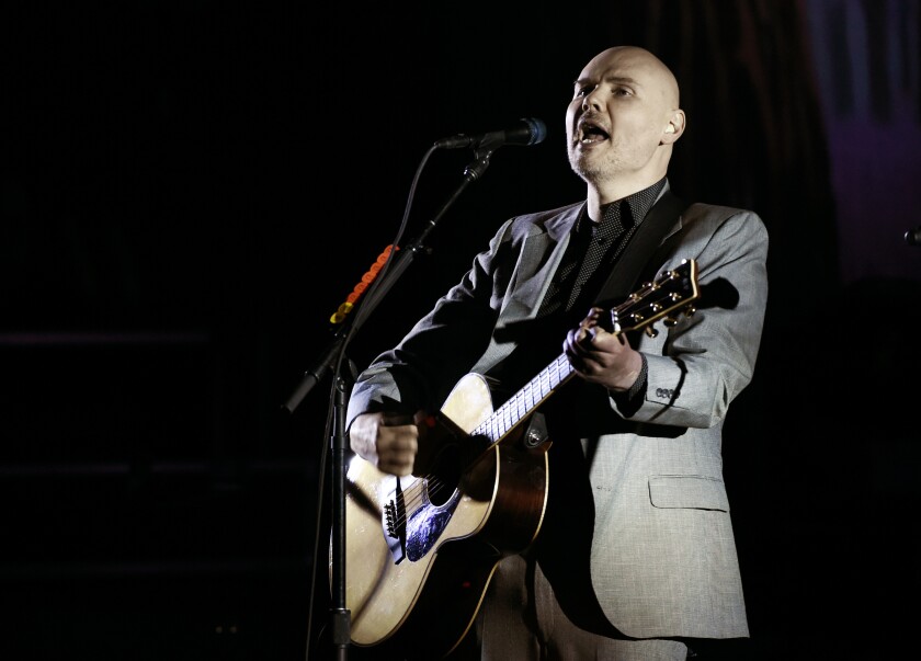 FILE - In this Saturday, March 26, 2017 file photo, Billy Corgan of the Smashing Pumpkins performs at The Theatre at Ace Hotel in Los Angeles. Corgan will perform a charity livestream show Wednesday, July 27, 2022 to benefit the victims of the Highland Park, Ill., fourth of July mass shooting, the Smashing Pumpkins frontman announced. (Photo by Chris Pizzello/Invision/AP, File)