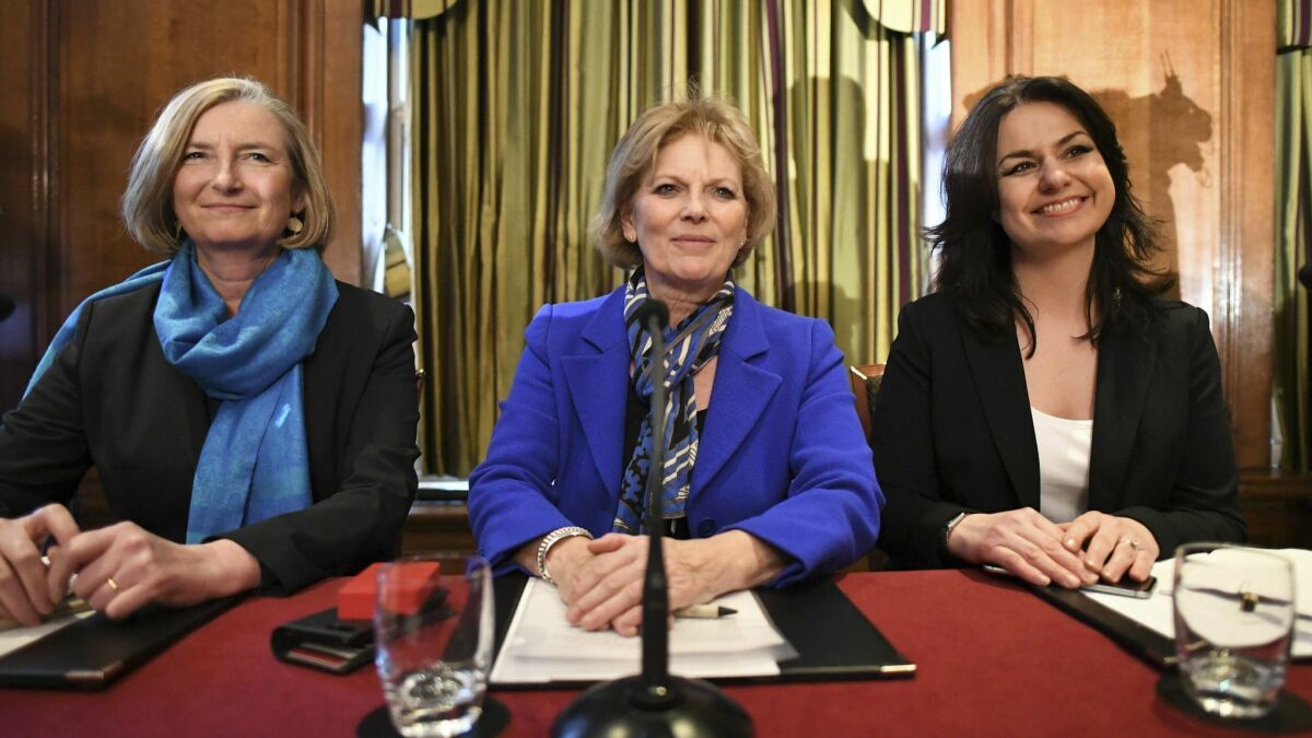 Pro-European British lawmakers, from left, Sarah Wollaston, Anna Soubry and Heidi Allen quit the governing Conservatives to join a newly formed centrist alliance dubbed the Independent Group.
