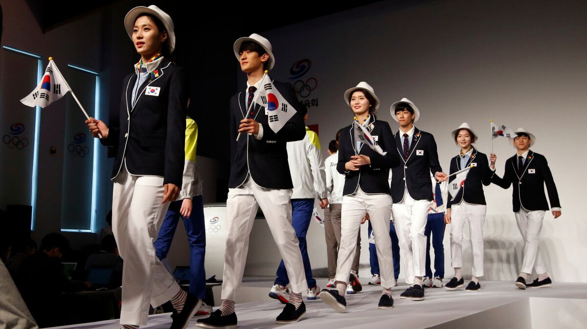 The South Korean Olympic team uniforms, shown at their April 27 unveiling in Seoul, were designed by Beanpole.
