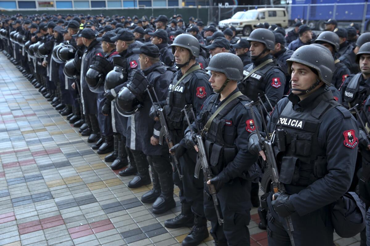 Lines of police stand in front of Elbasan Arena in Albania, where the Israeli national soccer team played a World Cup qualifier Saturday and, according to police in neighboring Kosovo, an attack planned by Islamic State was prevented.