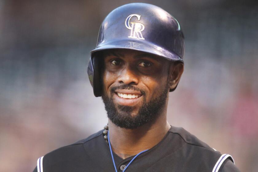 Colorado Rockies shortstop Jose Reyes, shown last year, is the second player to be suspended under baseball's domestic violence policy, which was adopted last August.