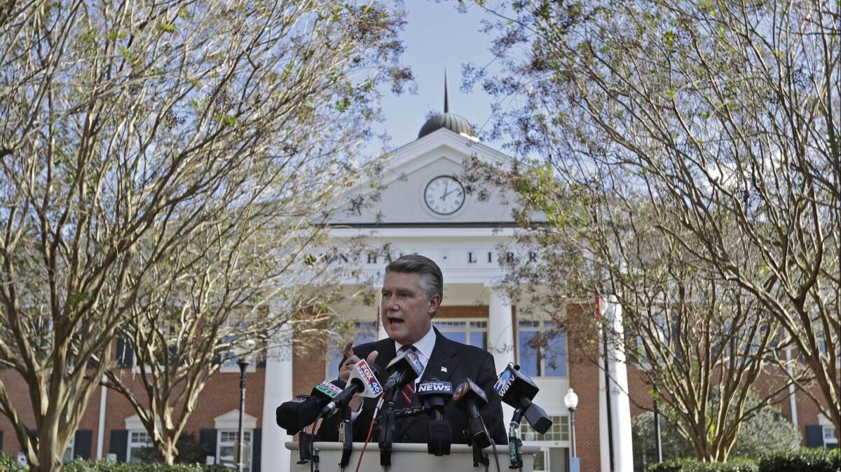 Republican Mark Harris speaks to the media in Matthews, N.C., the day after the midterm election.