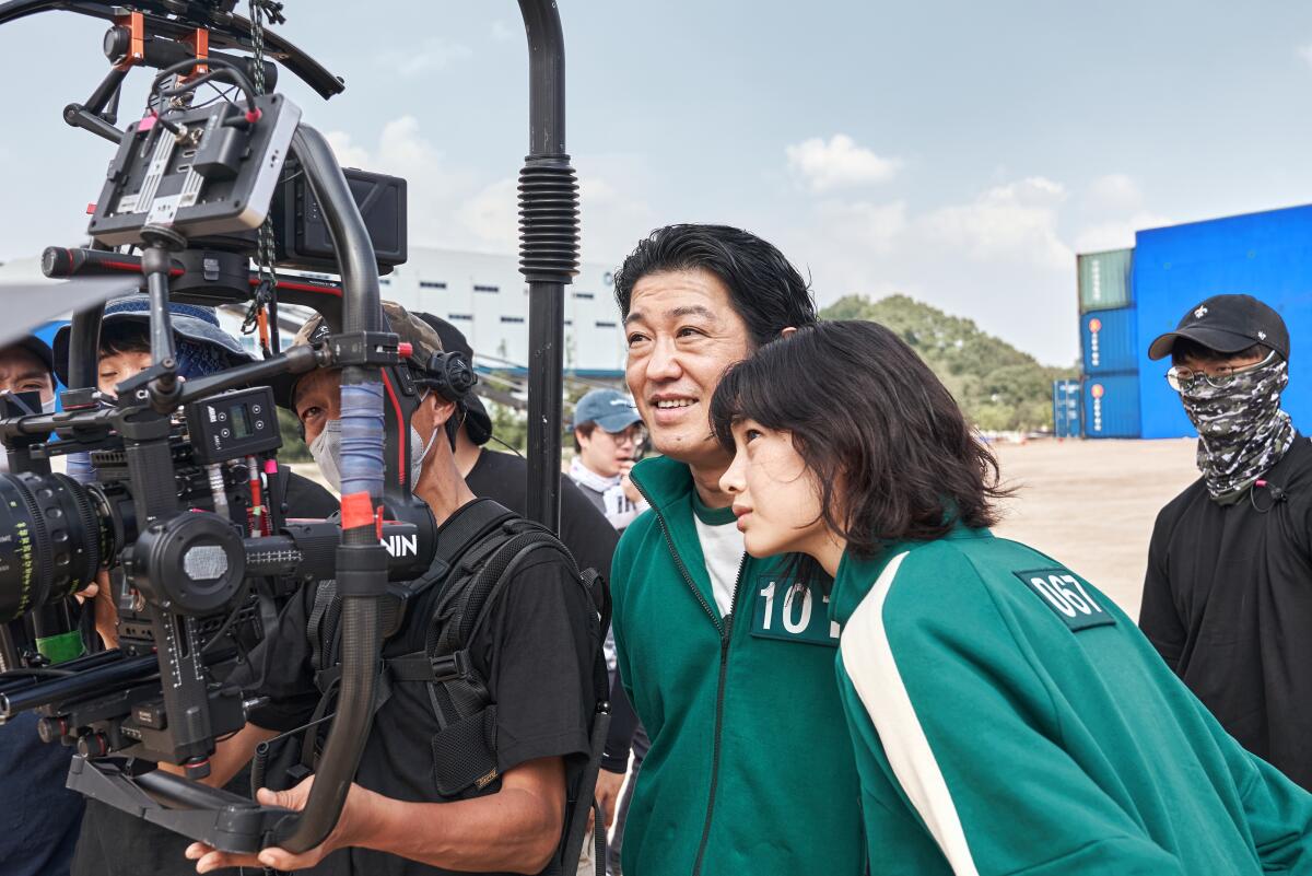 Jung Ho-yeon and Heo Sung-tae during filming of "Squid Game."