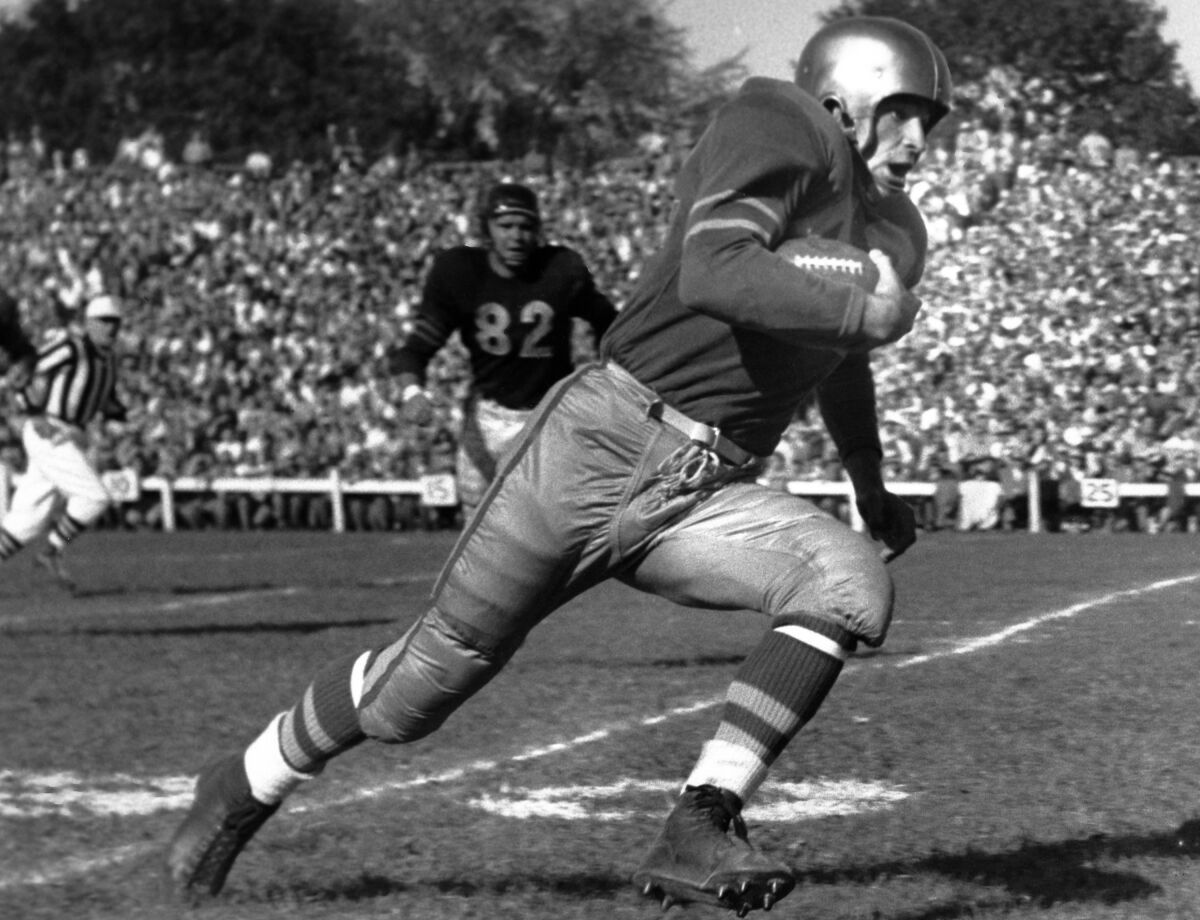 Al Carmichael on the football field in 1953.