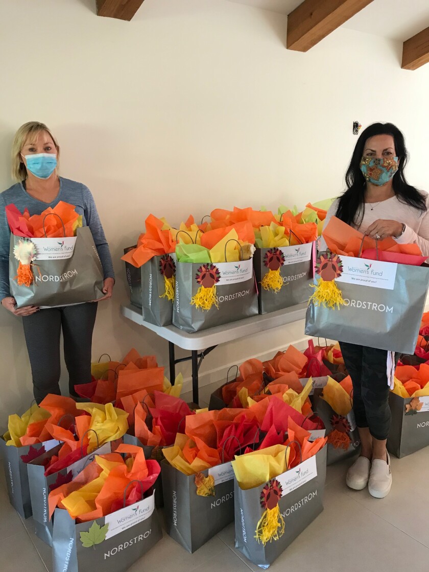Rancho Santa Fe Women’s Fund members preparing care packages.