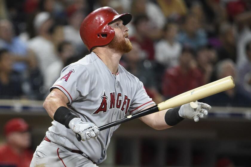 SAN DIEGO, CA - AUGUST 13: Kole Calhoun #56 of the Los Angeles Angels hits an RBI double during the tenth inning of a baseball game against the San Diego Padres at PETCO Park on August 13, 2018 in San Diego, California. (Photo by Denis Poroy/Getty Images) ** OUTS - ELSENT, FPG, CM - OUTS * NM, PH, VA if sourced by CT, LA or MoD **