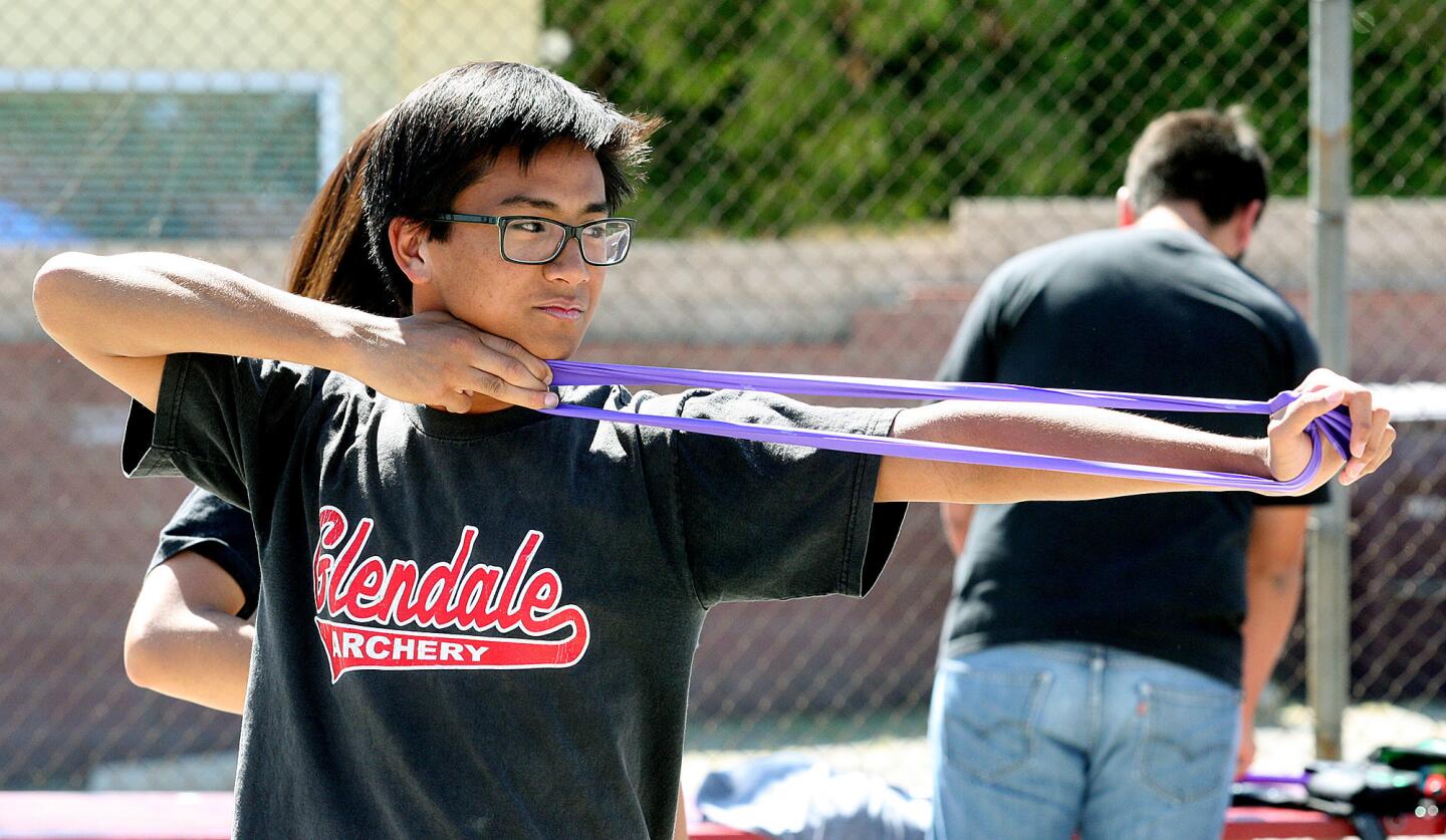 Photo Gallery: Olympic archer Khatuna Lorig visits to help Glendale High School archery team