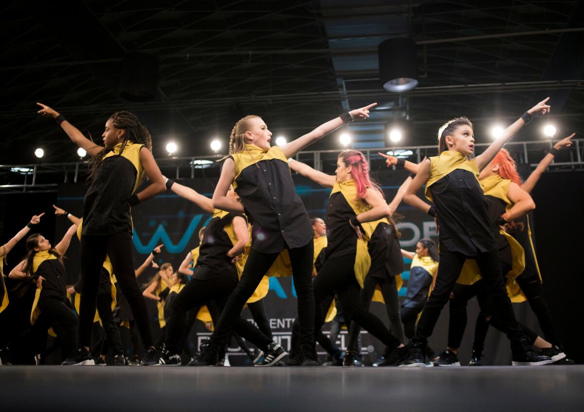 Los Angeles-based MDC Crew perform in the youth division. (Jenna Schoenefeld / For The Times)