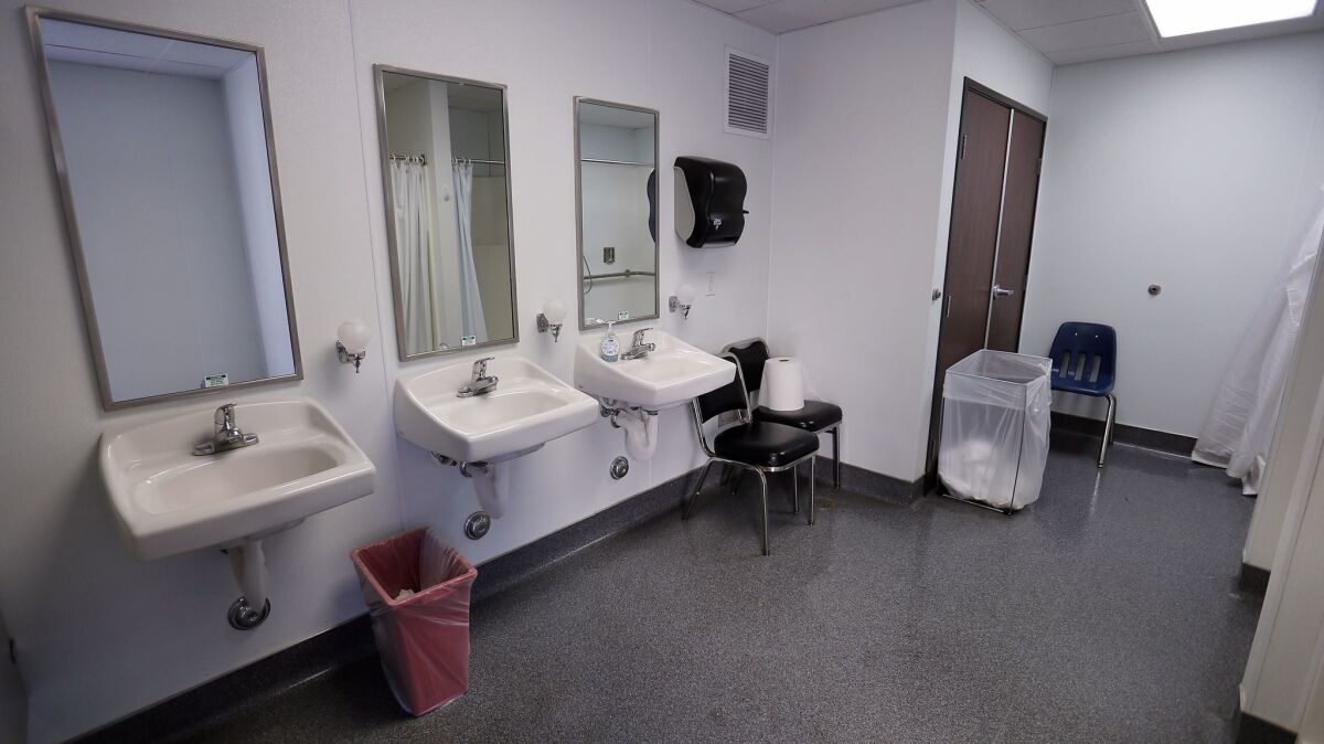 The new Skid Row Community ReFresh Spot hygiene center serving homeless with showers, toilets and staff offering referrals to housing and services.