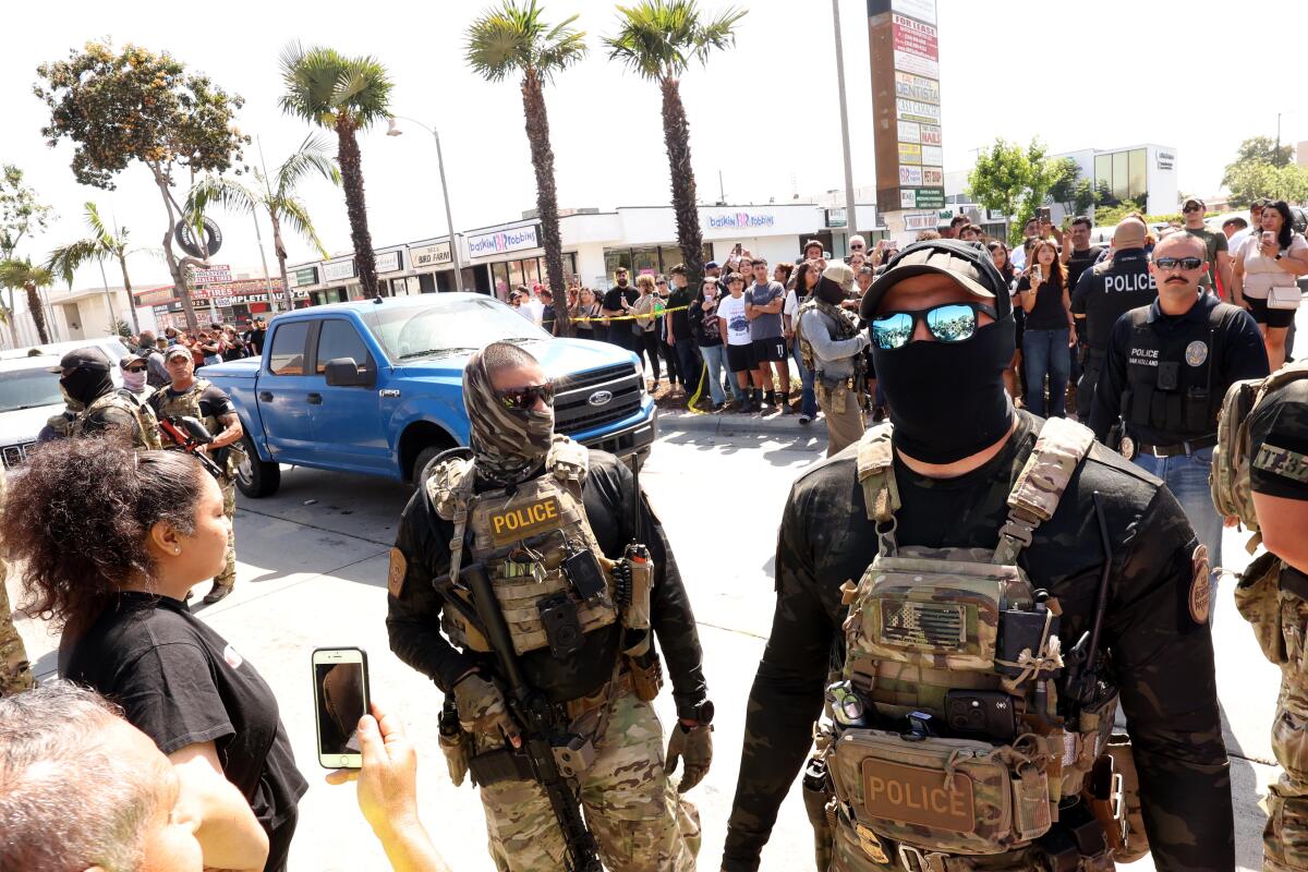 Residents confront ICE agents and Border Patrol agents as residents scream over their presence