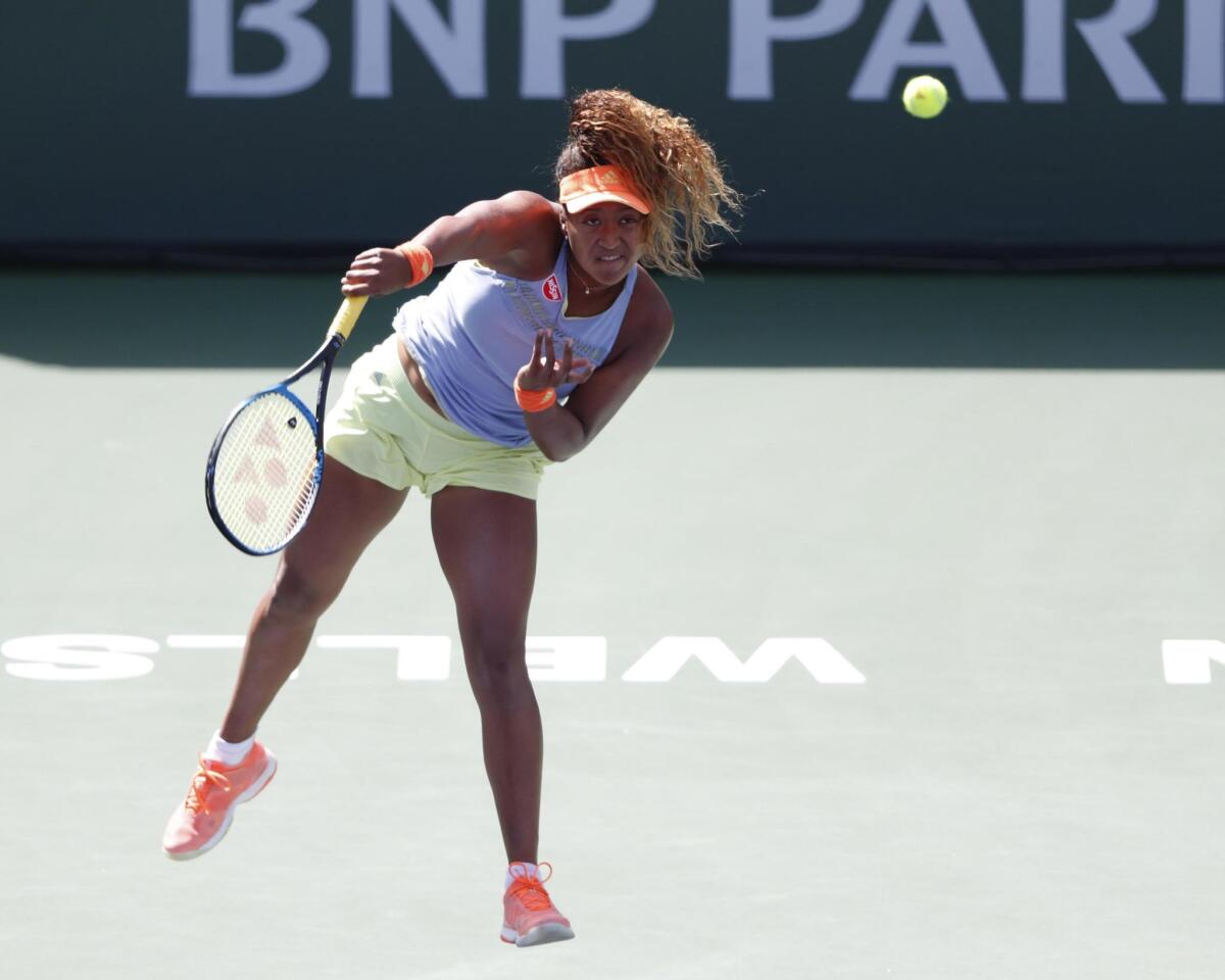 PBX03. Indian Wells (United States), 18/03/2018.- Naomi Osaka of Japan in action against Daria Kasatkina of Russia during their BNP Paribas Open women's final at the Indian Wells Tennis Garden in Indian Wells, California, USA, 18 March 2018. (Abierto, Tenis, Rusia, Japón, Estados Unidos) EFE/EPA/PAUL BUCK ** Usable by HOY and SD Only **