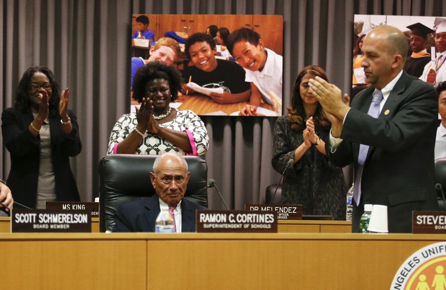 LAUSD board members and staff give a standing ovation to outgoing LAUSD Supt. Ramon C. Cortines during the annual meeting at LAUSD headquarters.
