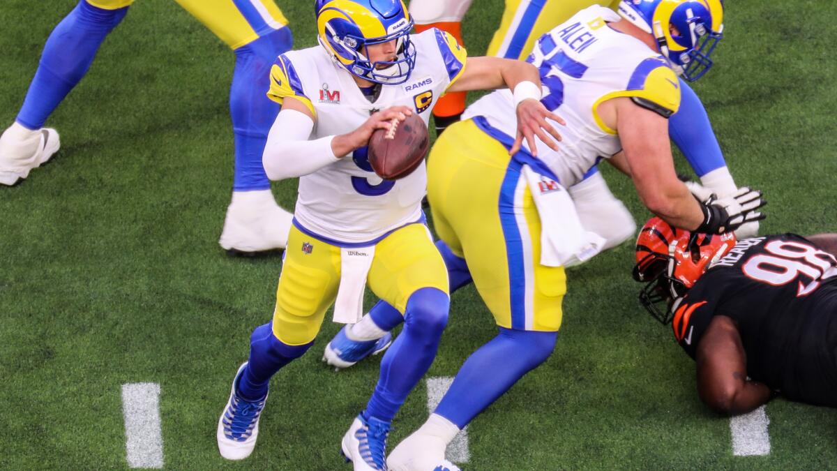 Kansas City Chiefs running back Ronald Jones (2) runs the ball against Los  Angeles Rams cornerback Jalen Ramsey (5) and Rams linebacker Ernest Jones  (53) during the second half of an NFL