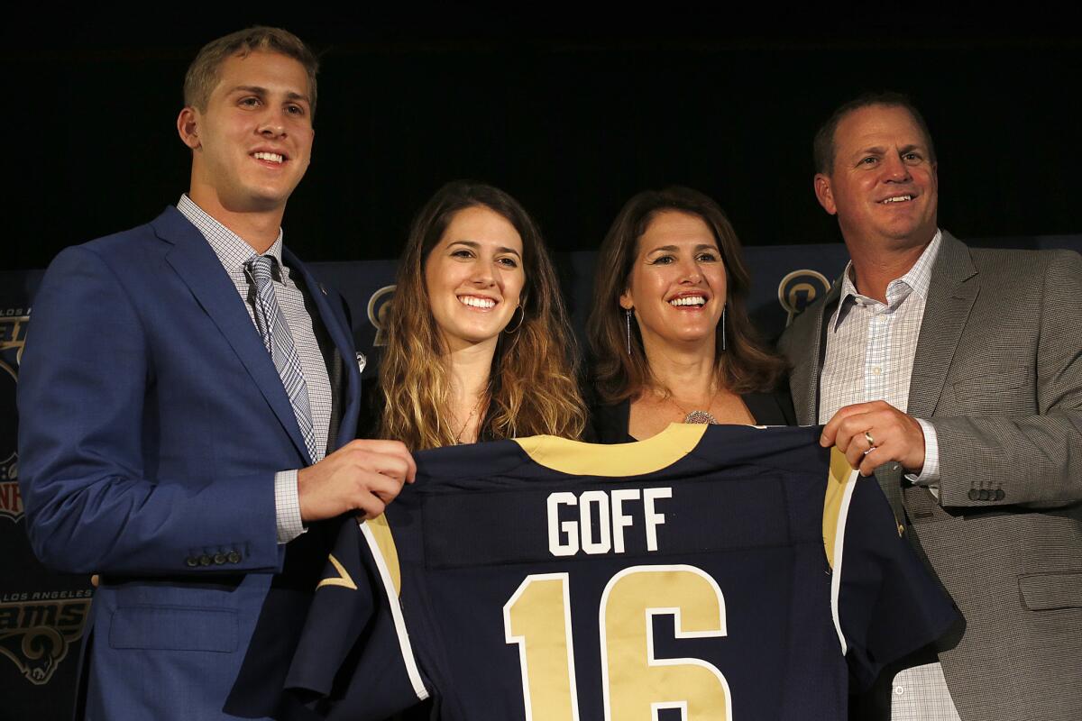 Jared Goff, left, the No. 1 pick in the 2016 NFL draft, is introduced as the newest member of the Los Angeles Rams during a news conference. Joining him on stage, from left, are his sister, Lauren; his mother, Nancy; and his father, Jerry.