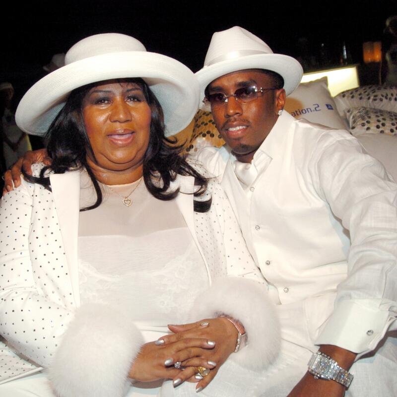 Aretha Franklin and Sean Combs at a "White Party."