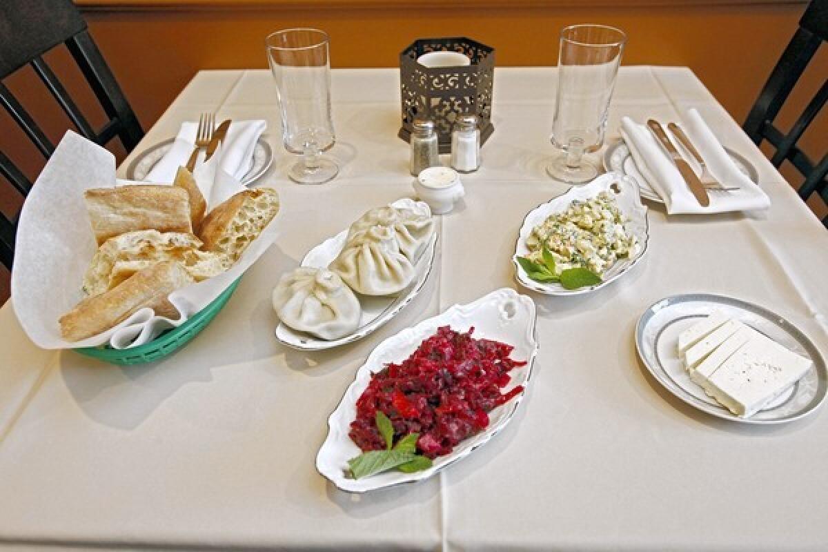 From left, filling Georgian bread, Khinkali, Venegret, Stolichny salad and cheese, at Old Village Restaurant at the 1100 block of S. Central Avenue in Glendale.