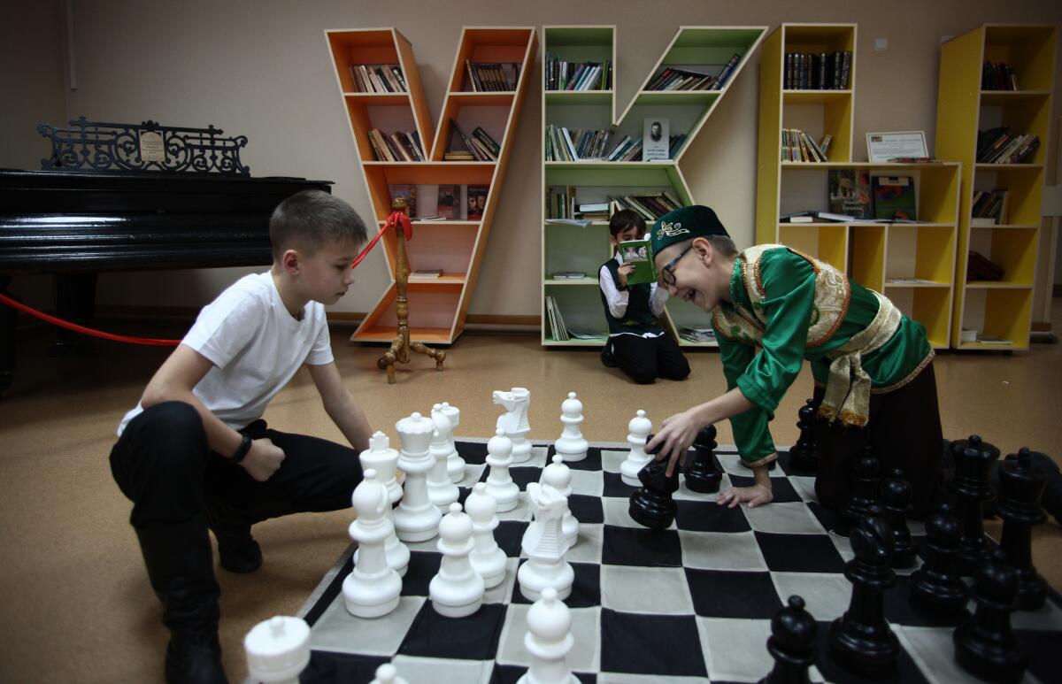 Children play chess