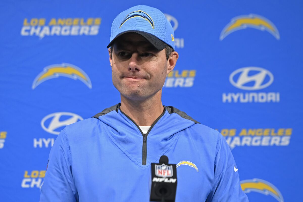 Chargers head coach Brandon Staley grimaces during a news conference