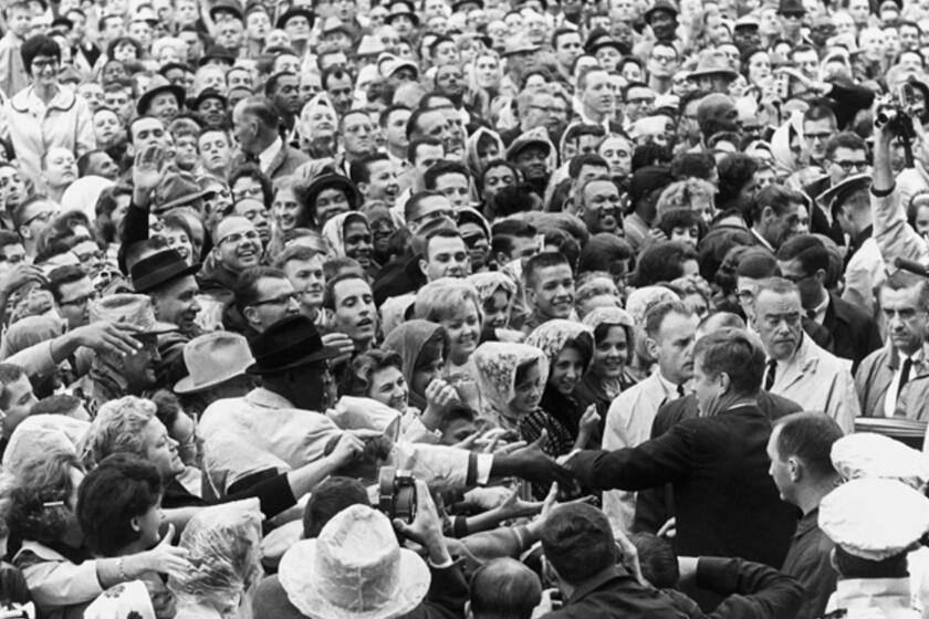 epa05990668 A handout photo made available by the John F. Kennedy Presidential Library shows US President John F. Kennedy (C-R) greeting a large crowd at rally in Ft. Worth, Texas, USA, 22 November 1963 (issued on 26 May 2017). The former President of the United States, John F. Kennedy, who was assassinated at the age of 46 on 22 November 1963, will have his 100th birthday observed at the John F. Kennedy Presidential Library on 29 May 2017. Kennedy was born in Brookline, Massachusetts on 29 May 1917. EPA/CECIL STOUGHTON / JFK PRESIDENTIAL LIBRARY / HANDOUT HANDOUT EDITORIAL USE ONLY/NO SALES ** Usable by LA, CT and MoD ONLY **