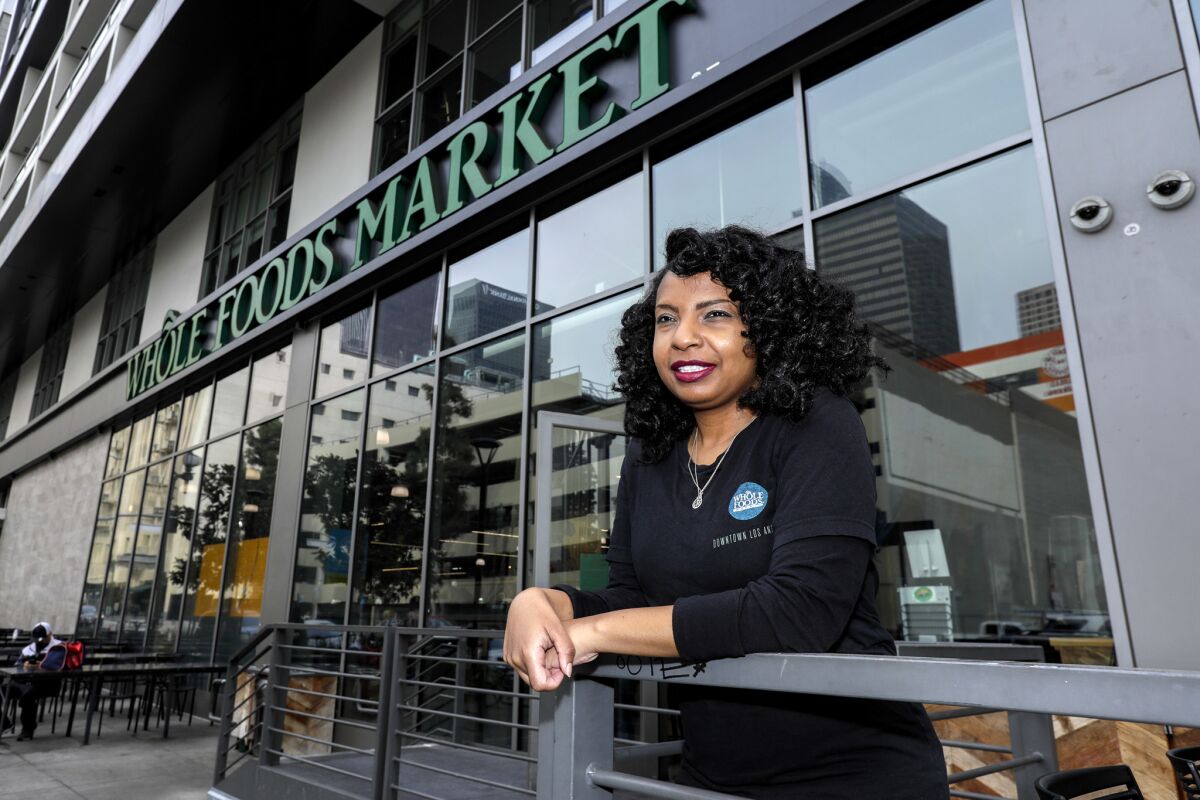 Alissa Harrison, a cashier at Whole Foods, says fluctuating hours leave her little time with friends and family.