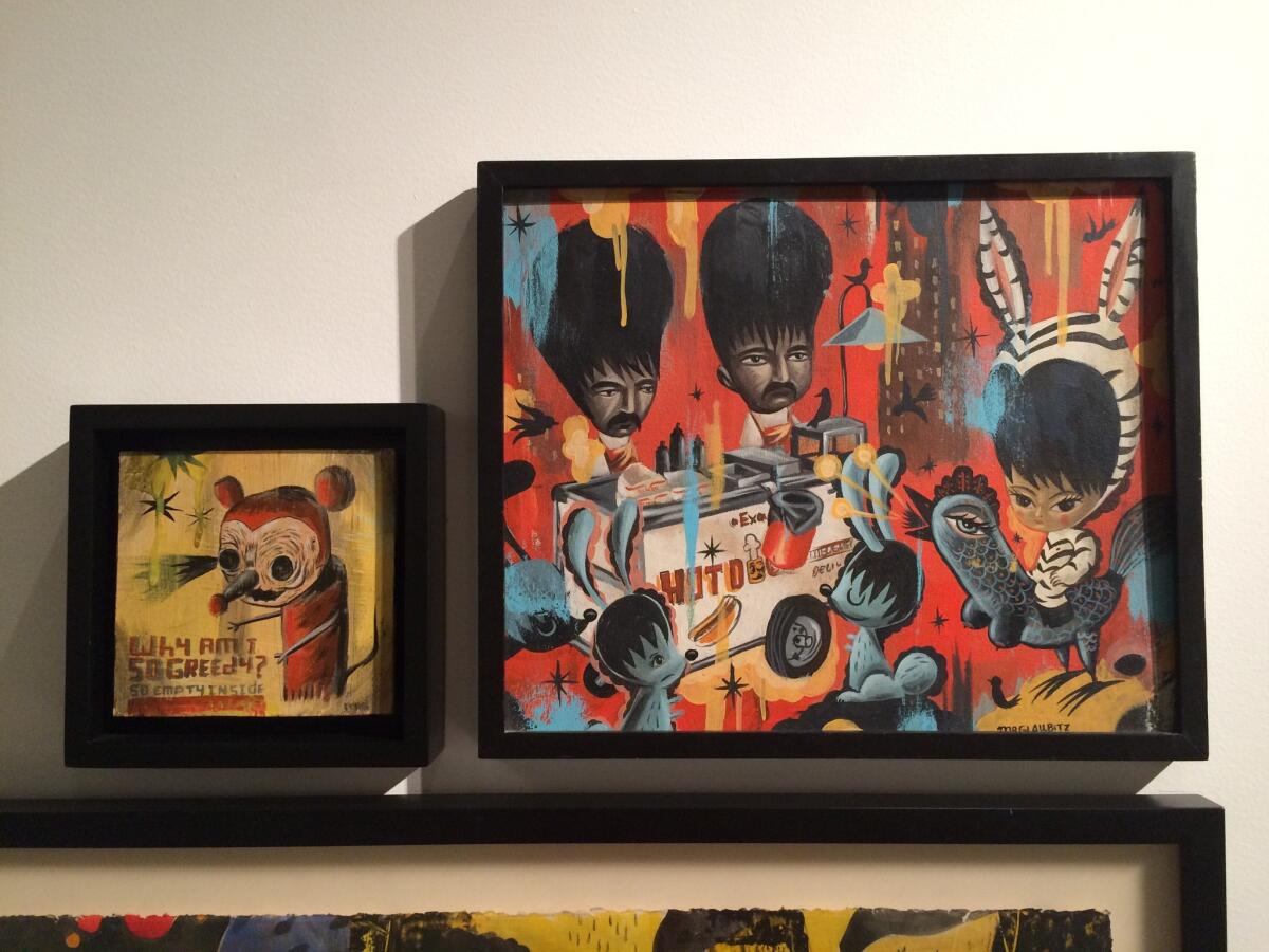 Paintings by Charles Glaubtiz on view at CECUT: "Perros Calientes," right, from 2003, and "Why Am I So Greedy?" from 2004.