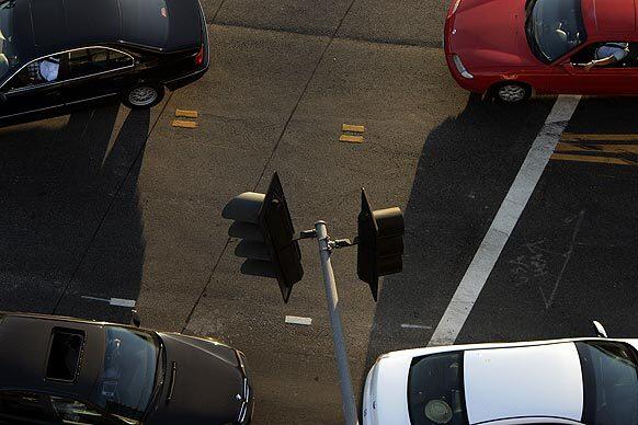 Mid-week traffic gets the green light at Sepulveda Boulevard and Dickens Street in Sherman Oaks. Commuters say they want less traffic, but they dont want to be forced to alter their habits, planners say.