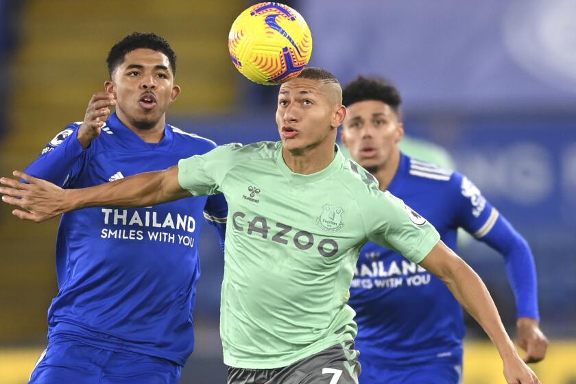 Leicester's Wesley Fofana, left, duels for the ball with Everton's Richarlison during the English Premier.