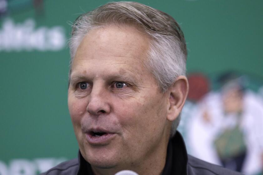 FILE - In this June 23, 2017, file photo, Boston Celtics team president Danny Ainge speaks at the team's practice facility in Waltham, Mass. The Celtics said that Ainge suffered a mild heart attack Tuesday night, April 30, 2019, in Milwaukee, where the team played the Bucks in the second round of the NBA playoffs. The team said he received immediate medical attention and is expected to make a full recovery. (AP Photo/Charles Krupa, File)