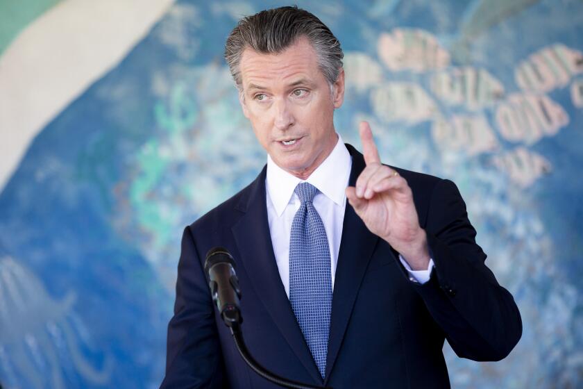 California Gov. Gavin Newsom speaks during a news conference at Carl B. Munck Elementary School, Wednesday, Aug. 11, 2021, in Oakland, Calif. Gov. Newsom announced that California will require its 320,000 teachers and school employees to be vaccinated against the novel coronavirus or submit to weekly COVID-19 testing. The statewide vaccine mandate for K-12 educators comes as schools return from summer break amid growing concerns of the highly contagious delta variant. (Santiago Mejia/San Francisco Chronicle via AP, Pool)