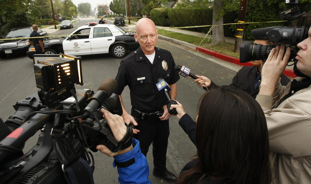 LAPD Cmdr. Andrew Smith addresses reporters at a 2013 news conference. Officials in Green Bay, Wisc., announced Tuesday that they had selected Smith as their next police chief.