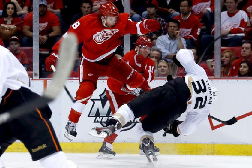 Detroit Red Wings' Justin Abdelkader checks Anaheim Ducks' Toni Lydman during the second period of Game 3.