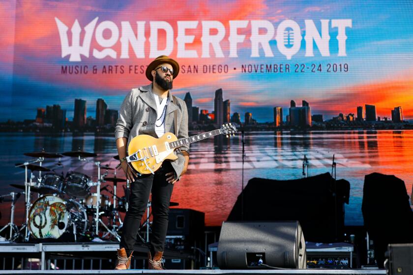 Shane Hall from the band Pepper, gets ready for the band's performance Friday afternoon on the Uncle Ed's Damn Good Vodka Stage at the Wonderfront Music and Arts Festival, at Embarcadero Marina Park North, November 22, 2019, in San Diego, California.